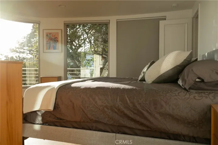 Primary Suite with expansive views and private balcony.