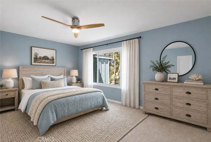 The primary bedroom is very spacious with beautiful tree-lined views, gentle sea breezes and an abundance of closet space.