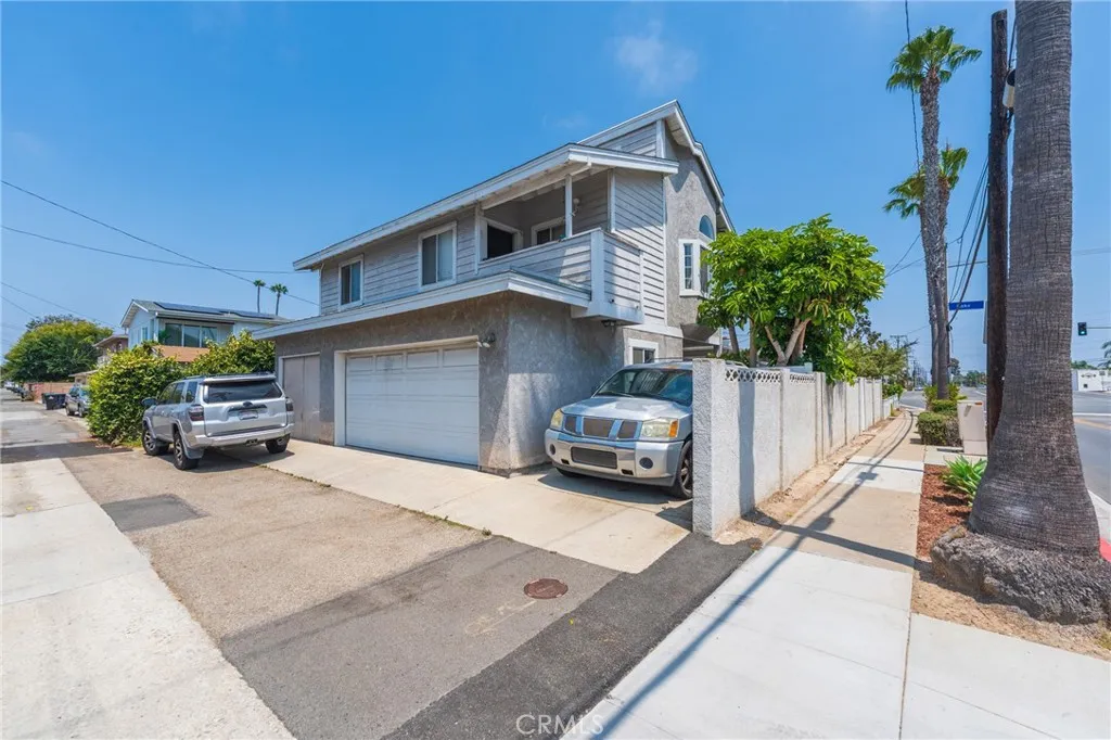 3 Car Garage w/ Additional Parking Spot AND Room to Park In Front Of Garages