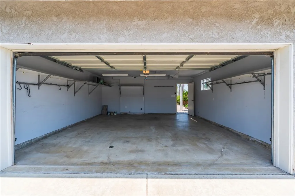 2 Car Garage - Single Car Garage To The Left and Additional Private Parking Spot To The Right