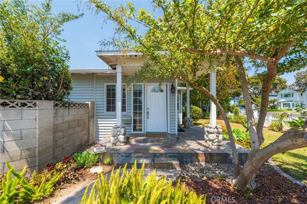 Welcoming Front Entry With Raised Porch