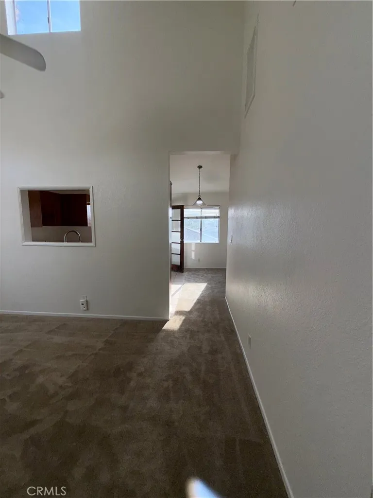 Living Room Leading into Dining Area And Kitchen
