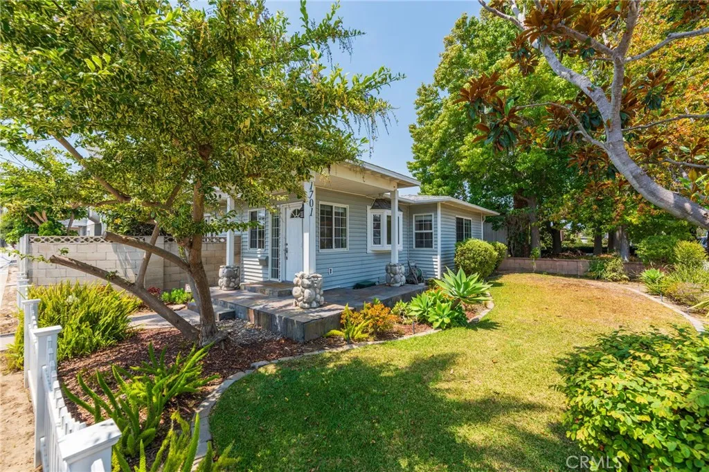 Wrap-Around Front Porch And Gated Front Yard