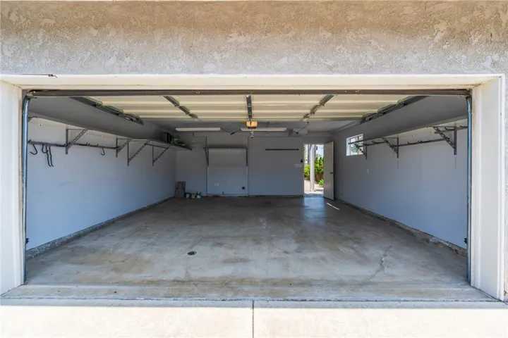 2 Car Garage - Single Car Garage To The Left and Additional Private Parking Spot To The Right
