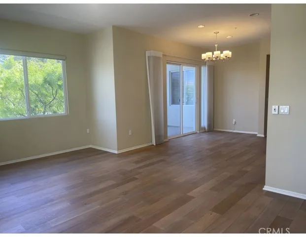 Family Room looking into the Dining Area and out to the private deck.