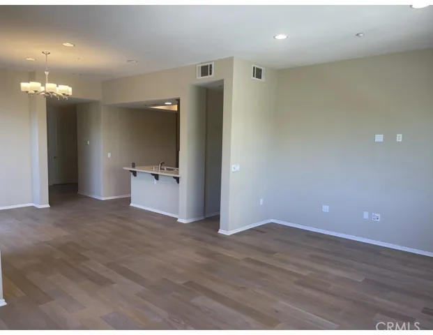 Family Room looking back toward the Kitchen and Dining Area