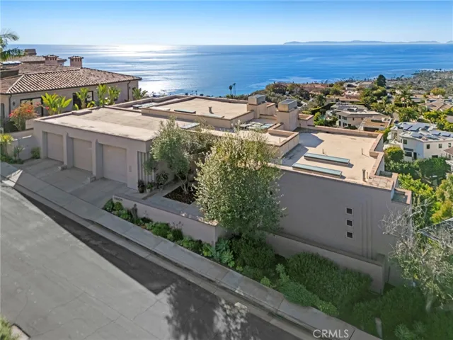 A three-car garage completes the property.