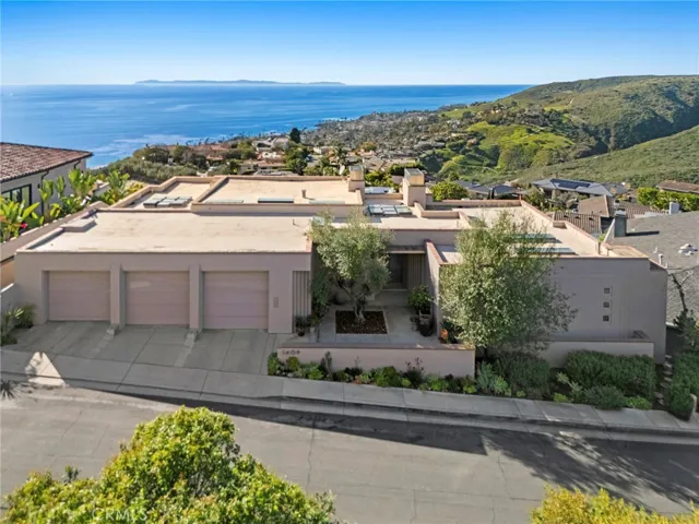 Sweeping ocean views from every room define this substantial custom residence, completed in 1997 and set on a wide-frontage 13,360-square-foot lot.