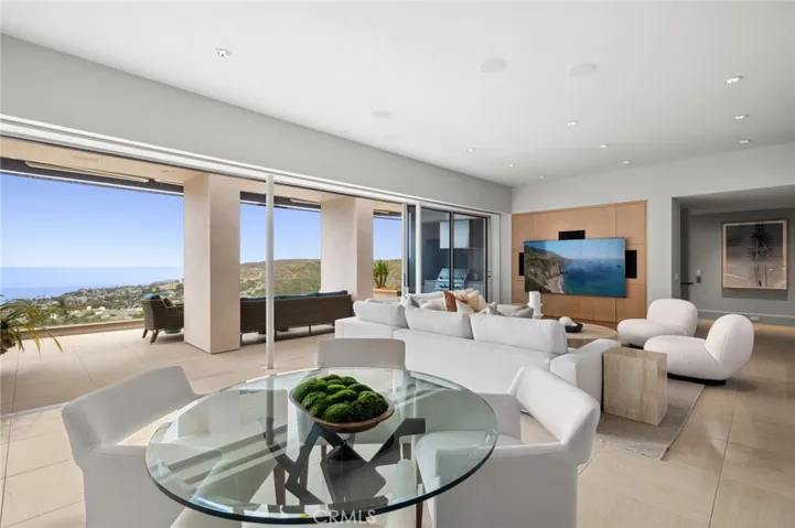 Additional features include blackout and solar shades in nearly every room, an electric awning on the main deck, and central air conditioning and heating with a four-zone HVAC system.