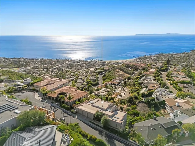  Located on a cul-de-sac in the sought-after Mystic Hills neighborhood and crafted by contractor Mark Falcone with interiors by Sheldon Harte.