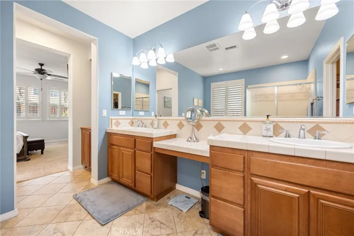 En-Suite Bathroom with Dual-Sinks, Vanity area and Over-Sized Mirror