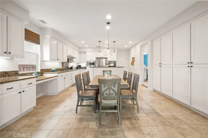 Dining & Kitchen Room areas with an abundance of Pantry & Countertop space