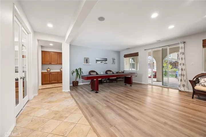 Game Room with built-in Speakers and Patio Slider access