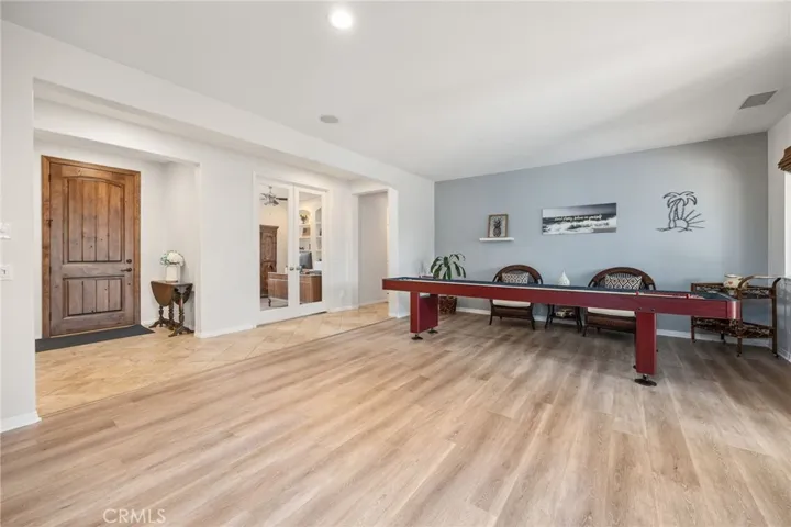 Custom Wood Front Door, Office & Game Room areas