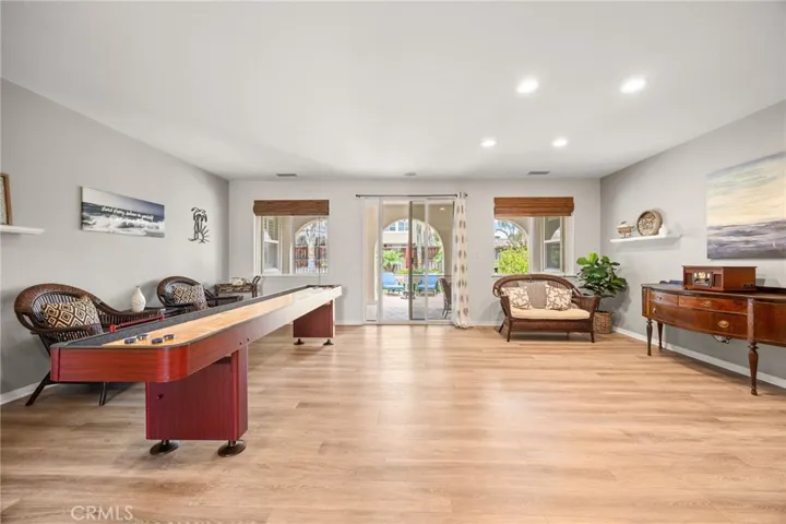 Game Room with built-in Speakers and Patio access