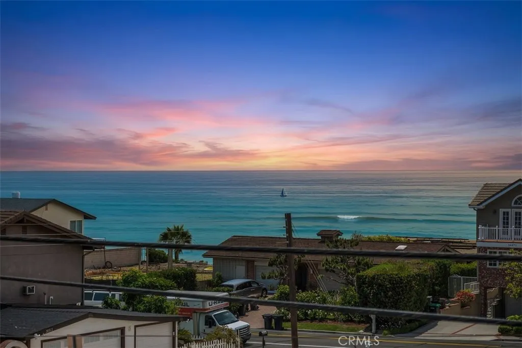Unit A - Primary Bedroom Balcony Ocean View (Virtual Day to Dusk Sky)