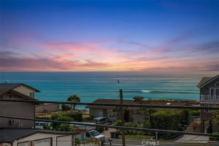 Unit A - Primary Bedroom Balcony Ocean View (Virtual Day to Dusk Sky)