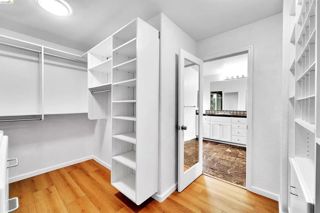 Customizable closet system with wood-finish flooring