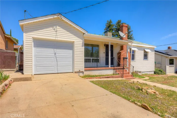 Front of home, single car garage