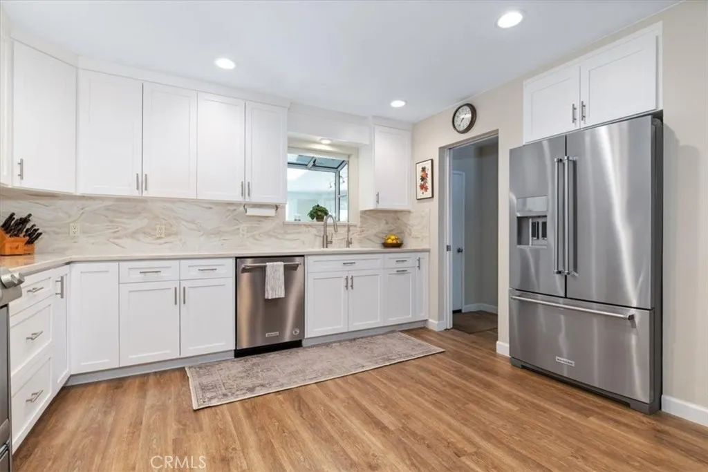 Appliances included in newer kitchen.