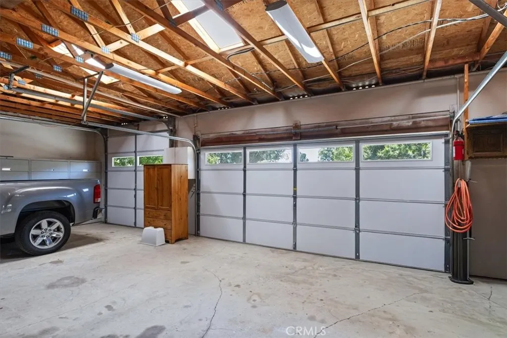 A double and single garage roll up doors.