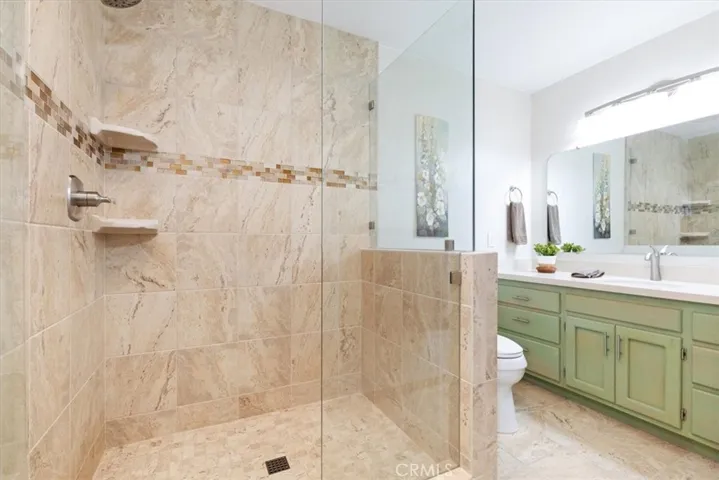 Primary Bathroom with step in shower.