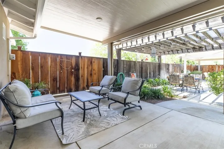 From patio off bedroom to covered areas for entertaining!