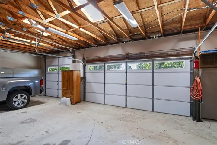 A double and single garage roll up doors.