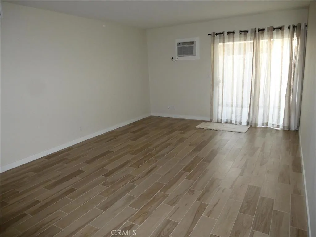 Living area with access to private patio