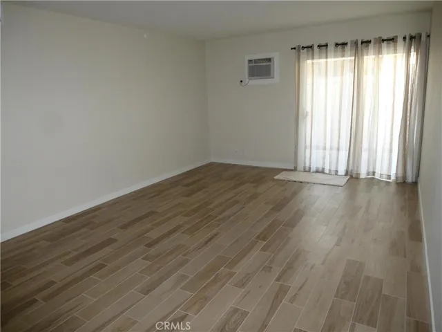 Living area with access to private patio