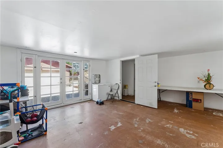 Large walk out room with double door entry