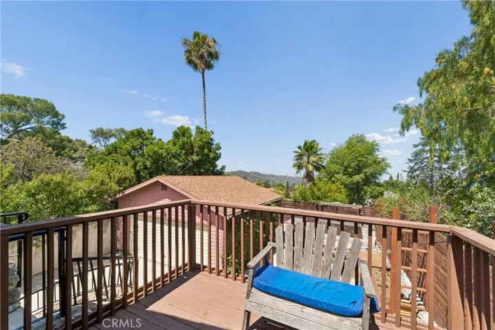 This great home features a balcony that offers mountain views.