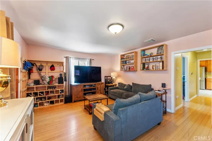 Living Room featuring hardwood flooring.