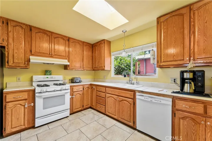 Spacious kitchen featuring an abundance of counter space and cabinetry for all your storage needs.
