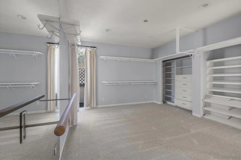 3rd Bedroom: Optional His/Her's Dressing Room/Children's Room/Office-Den/Home Gym, with Bathroom Ensuite. This Room has Custom Curated Closets and a Ballet Bar. This Room Opens to the Huge Balcony Adjoining the Primary Bedroom.