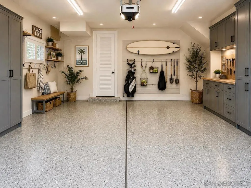 Large Two Car Garage with a Sink and Shelves. Virtually Staged.