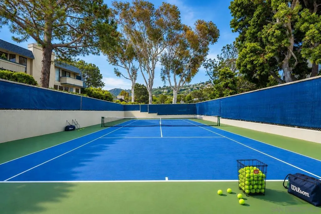 Common Area Tennis Court/Pickle Ball/Sports Court, with Practice Tennis/Pickle Ball Wall. Virtually Staged.