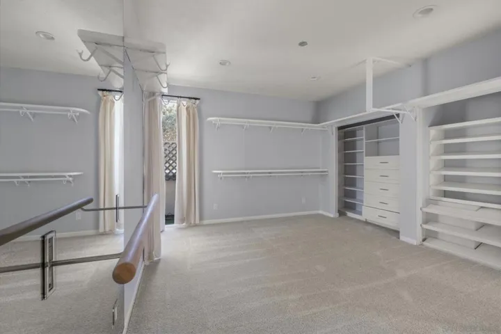 3rd Bedroom: Optional His/Her's Dressing Room/Children's Room/Office-Den/Home Gym, with Bathroom Ensuite. This Room has Custom Curated Closets and a Ballet Bar. This Room Opens to the Huge Balcony Adjoining the Primary Bedroom.