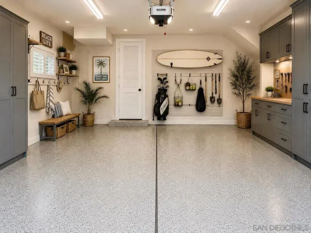 Large Two Car Garage with a Sink and Shelves. Virtually Staged.