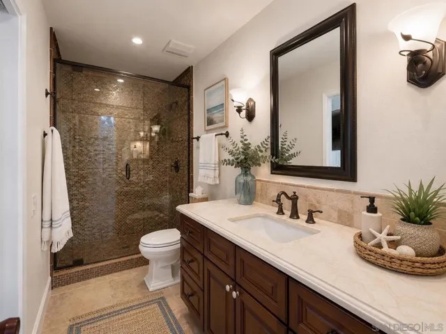 1st Floor Bathroom Ensuite to 1st Floor Bedroom/Den. Virtually Staged.