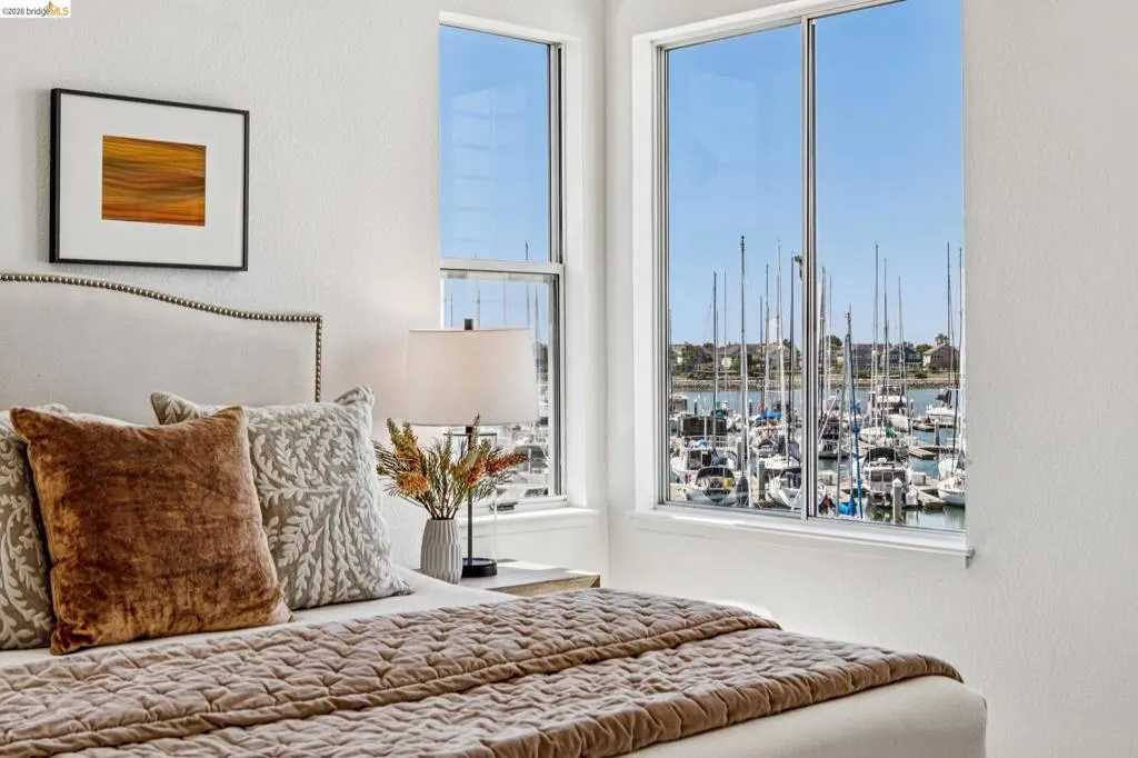Framed marina scenery through expansive windows