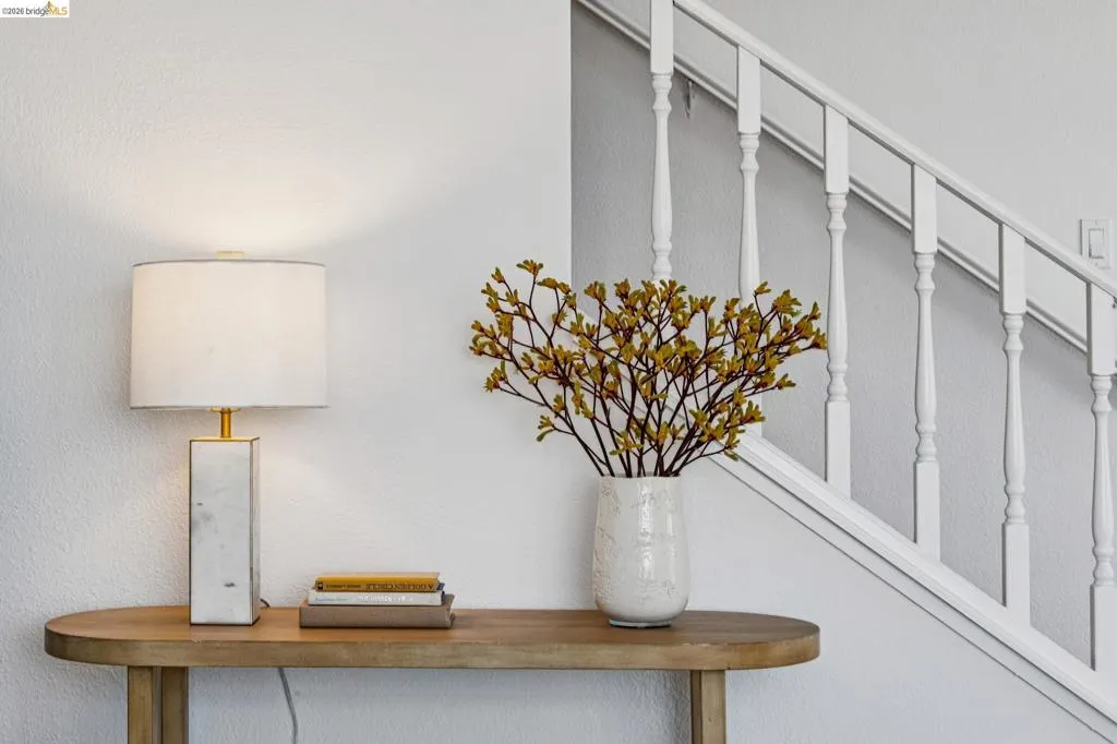 White painted staircase with classic balusters