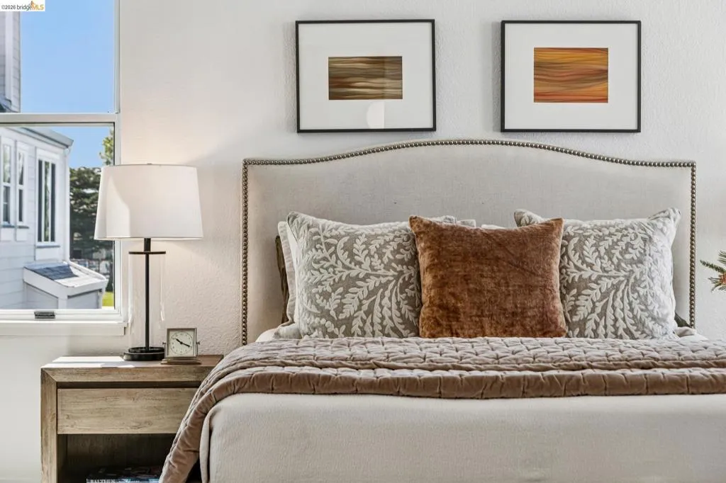 Upholstered headboard with nailhead trim