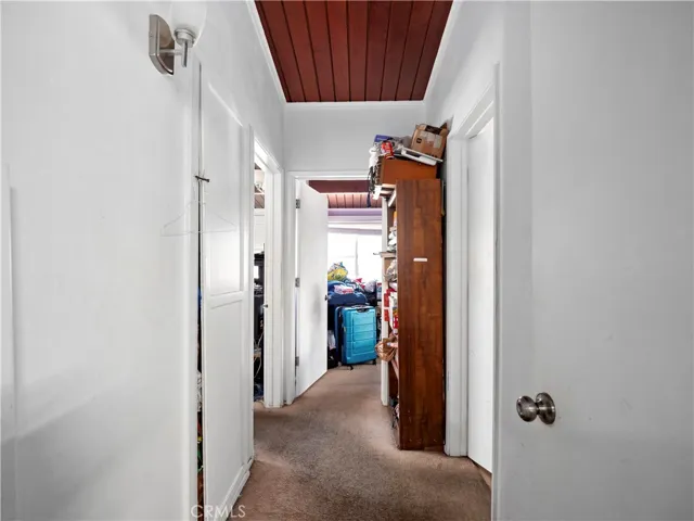 Hallway to bedrooms #1 & #2 and Primary Full Bathroom