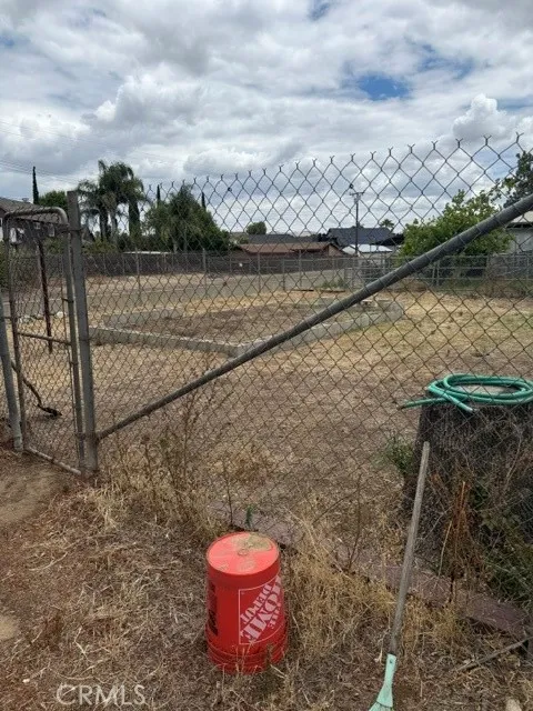 At side of shed
