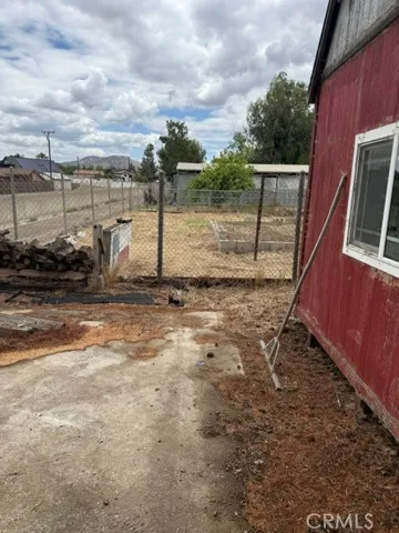 Behind 16x20 Shed