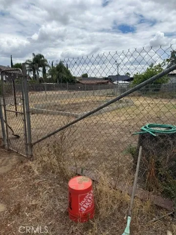 At side of shed
