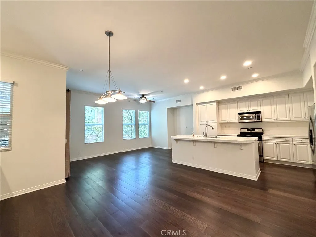 Living, Dining, and Kitchen Areas