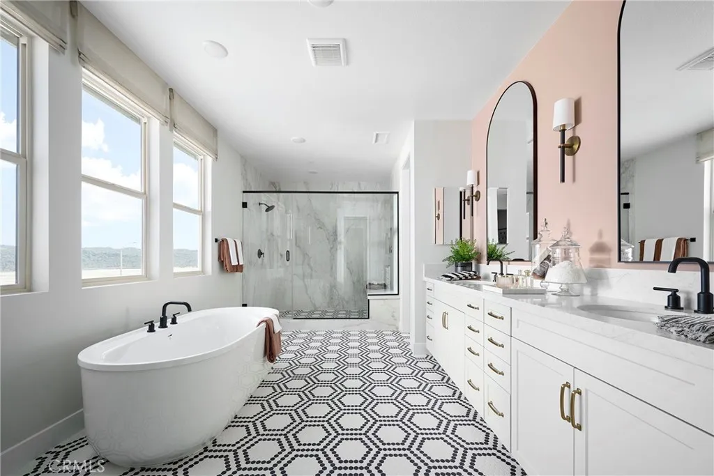 Model Photos: Photos shown are of the model home for this floor plan. Actual finishes, features, and landscaping may vary.
