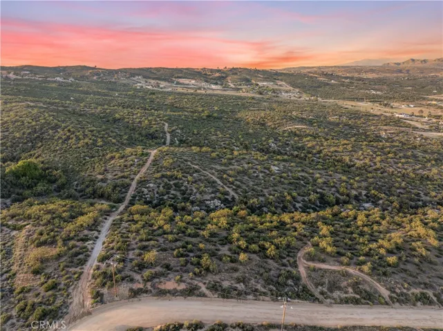 Looking toward the property from the road at the Botton of the picture
